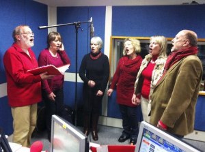 Rapsquillion on Genevieve Tudor's Sunday Folk, BBC Radio Shropshire. Allan Price, out of shot, throwing peanuts into band members' mouths!
